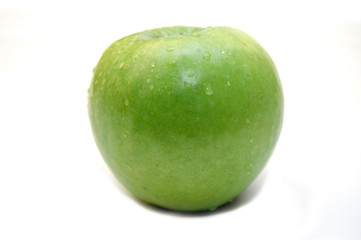 wet green apple on white