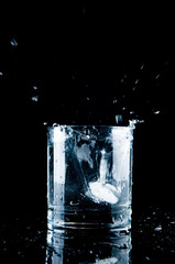 Glass of splashing water