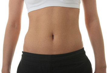 Fototapeta na wymiar Midsection of a physically fit young woman