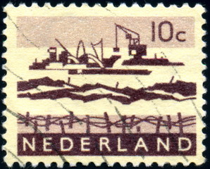 Nederland. Bateaux de dragage. Timbre postal oblitéré.