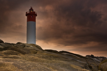 Lighthouse on Rocks - obrazy, fototapety, plakaty