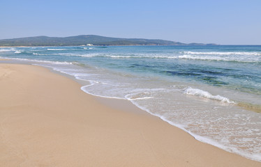 Sand and wave