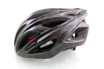 Fototapeta premium Black bicycle helmet on white background