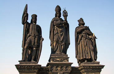 Fototapeta na wymiar Three statues on the Charles Bridge in Prague