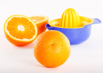 Orange juice, juicer and orange