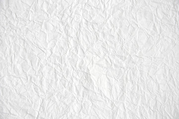 Crushed white paper texture.