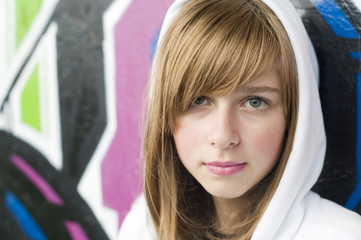 Teenage girl on graffiti background