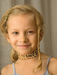 Portrait of 7-old girl with fun hairstyle.