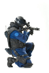 the soldier holding the weapon at a shoulder