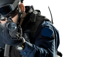 the soldier holding the weapon at a shoulder