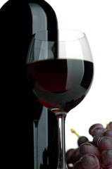 Red wine and grapes