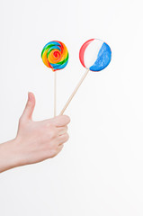 Female hand with lollipops