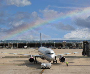 Airplane on rainbow airport
