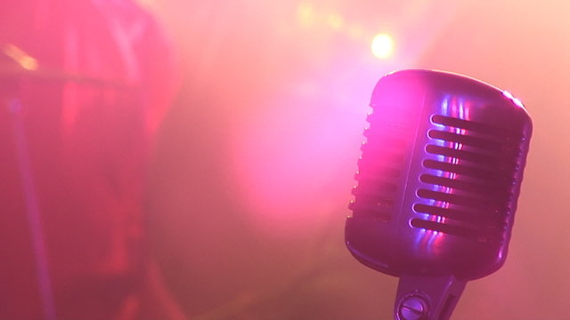 Microphone, colour lights, rock Concert.