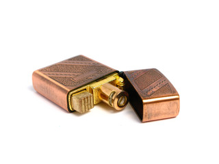 Old Bronze lighter on white background