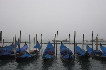 Fototapeta na wymiar Gondolas and fog