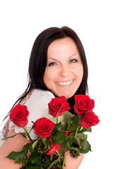 smiling woman with bouquet of flowers