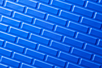 Wall of metallic bricks