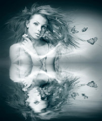 Portrait beautiful young woman with butterfly