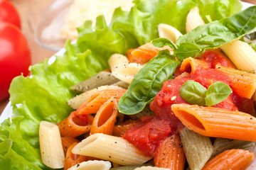 serving of colored penne pasta