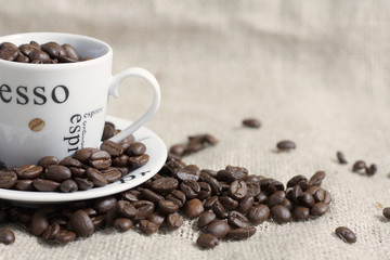 Coffee cup with coffee beans