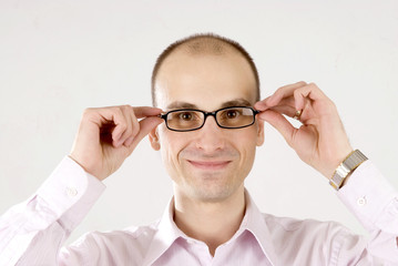 Fototapeta na wymiar Portrait of a happy man in glasses