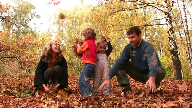 family of four throw leaves