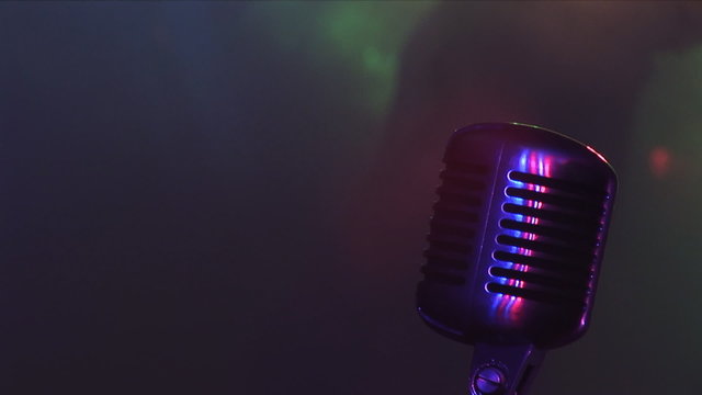 Microphone, colour lights, rock Concert.