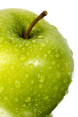 Green apple with water drops