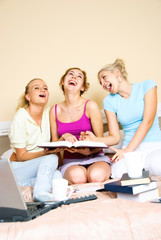 three laughing students