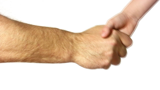 senior and child handshake