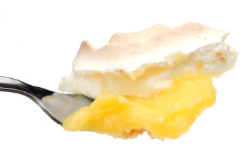 fork full of lemon meringue pie