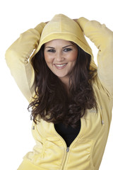 Beautiful Young Woman in Tracksuit with Hands up