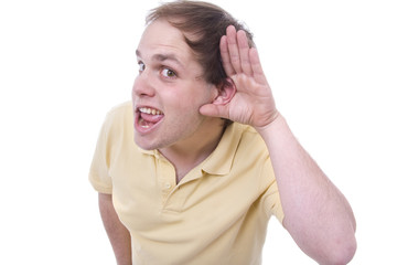 portrait of young casual man which overhears conversation