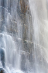 Fototapeta na wymiar Waterfall on mountain forest
