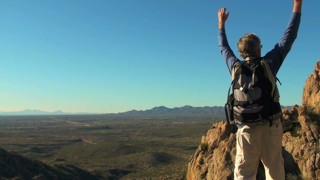 Hiker on cliff - HD