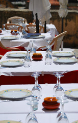 Table with plates, cups and cutlery