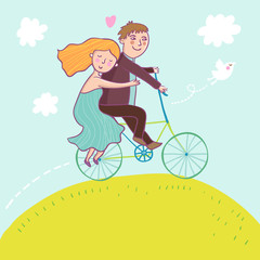 Couple riding a bicycle - summer concept
