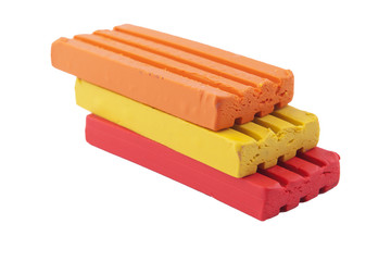 three bars of modeling clay