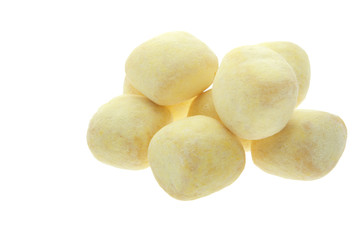yellow lemon toffee sweets isolated on white