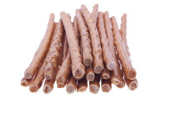 salted baked sticks isolated on white