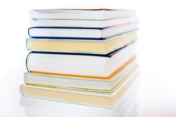 Pile of books isolated on white background