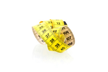 Yellow measuring tape isolated on white background