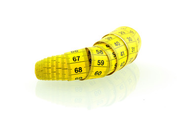 Yellow measuring tape isolated on white background