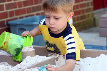 Boy playing in the Sandbox