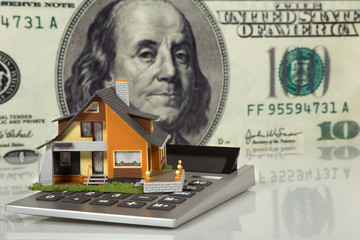 Real Estate concept  on big dollar background - 14345603