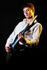 musician playing at the stage