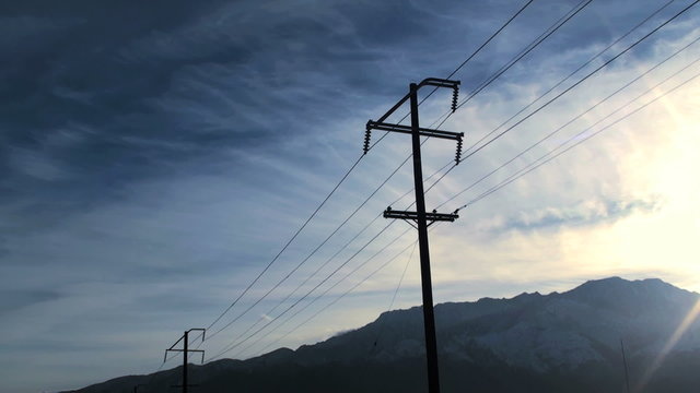 Electrical poles and clouds time lapse - HD