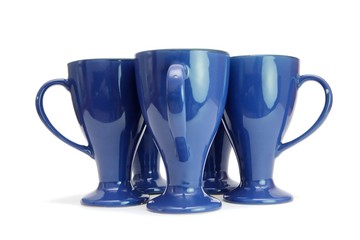 Five blue long-stemmed coffee cups with handles out isolated