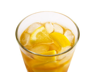 Glass ice-tea with the pieces of lemon